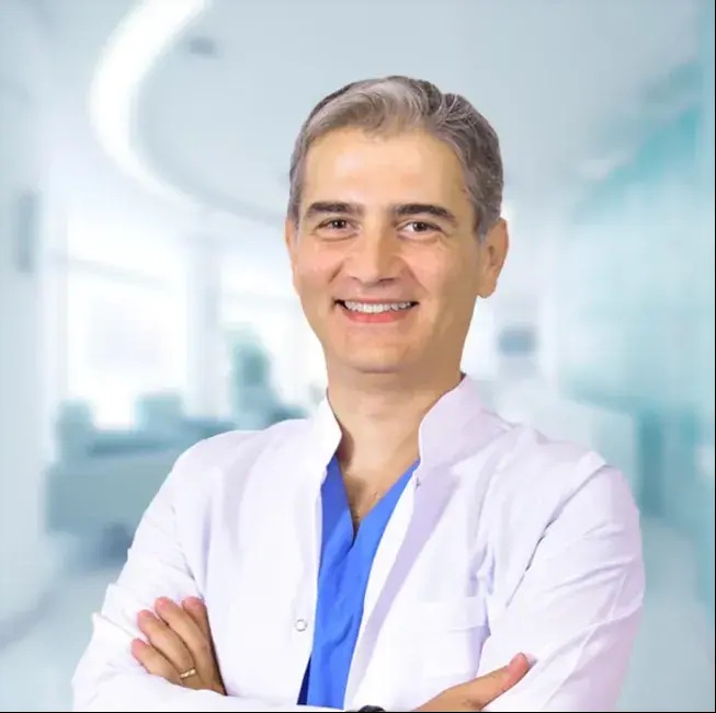 Prof. Dr. Nuri Tasali - background